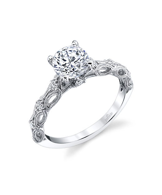 Vintage designer diamond solitaire engagement ring by Parade Design.